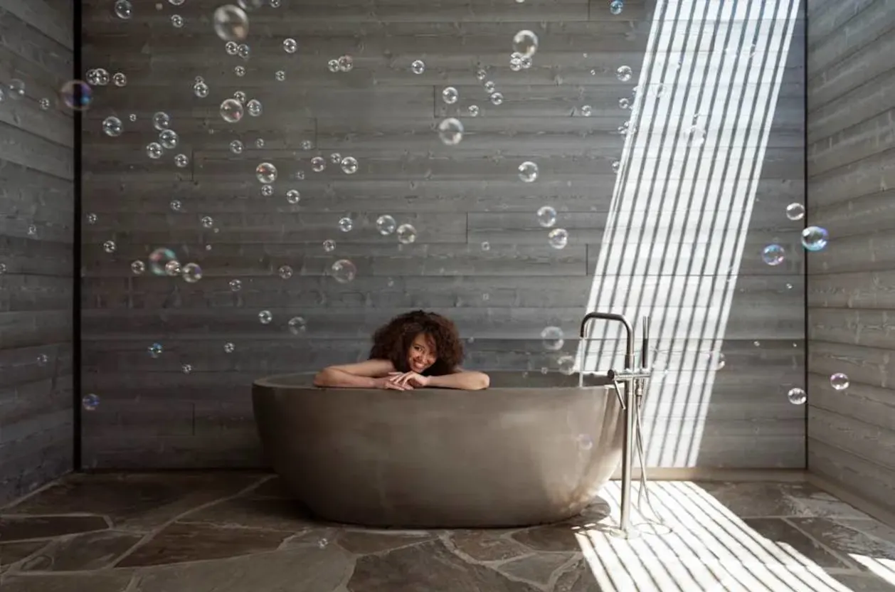 Guest in spa bathtub at Arizona Biltmore